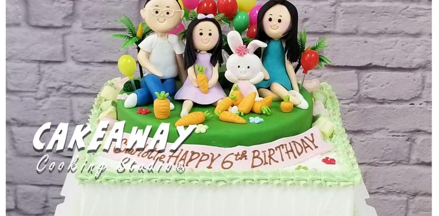 一家三口與寵物小兔子